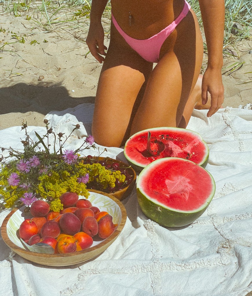 Beach picnic with summer fruit